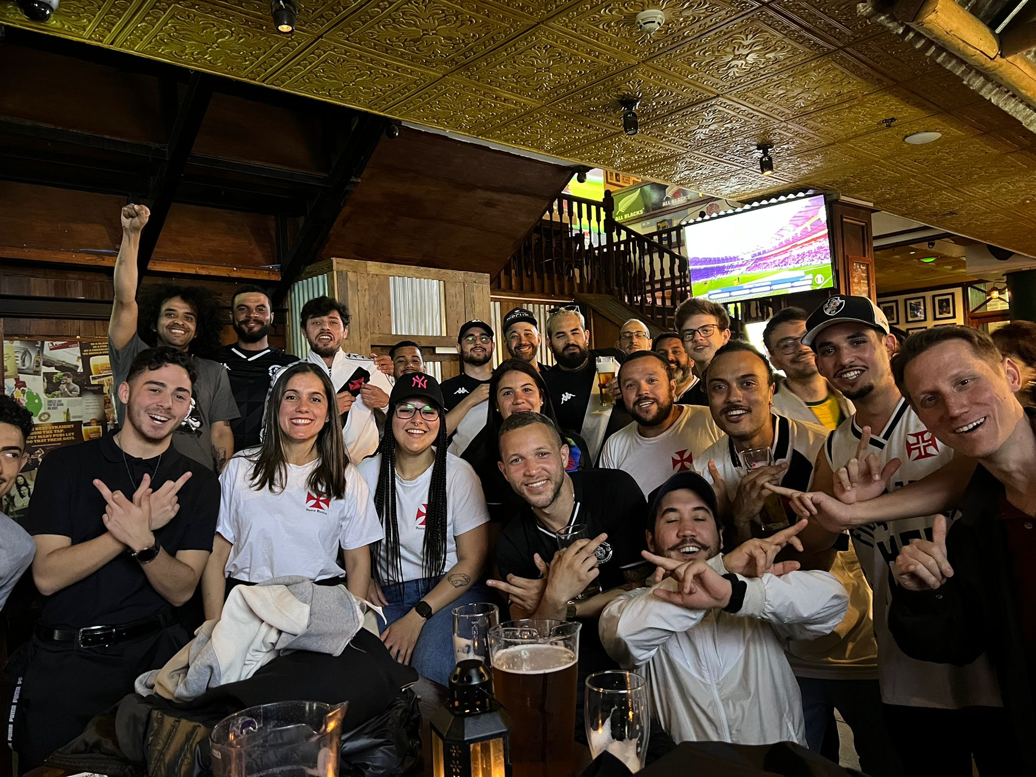 Vasco Dublin fans at a bar with pints